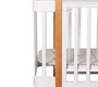 Кровать Indigo Bella 3в1 продольный маятник на колесах