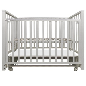 Детская кровать Indigo Norden с маятником и колесами 